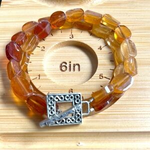 Citrine Double Strand bracelet with carved silver clasp. Measures 8”laying flat